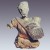 Figurina in ambra raffigurante un venditore di panni (fine I - inizi II secolo d.C.)
